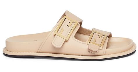 fendi slides with buckle.